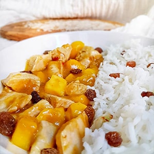 Receta de Arroz basmati con pollo en salsa de mango | DietBox